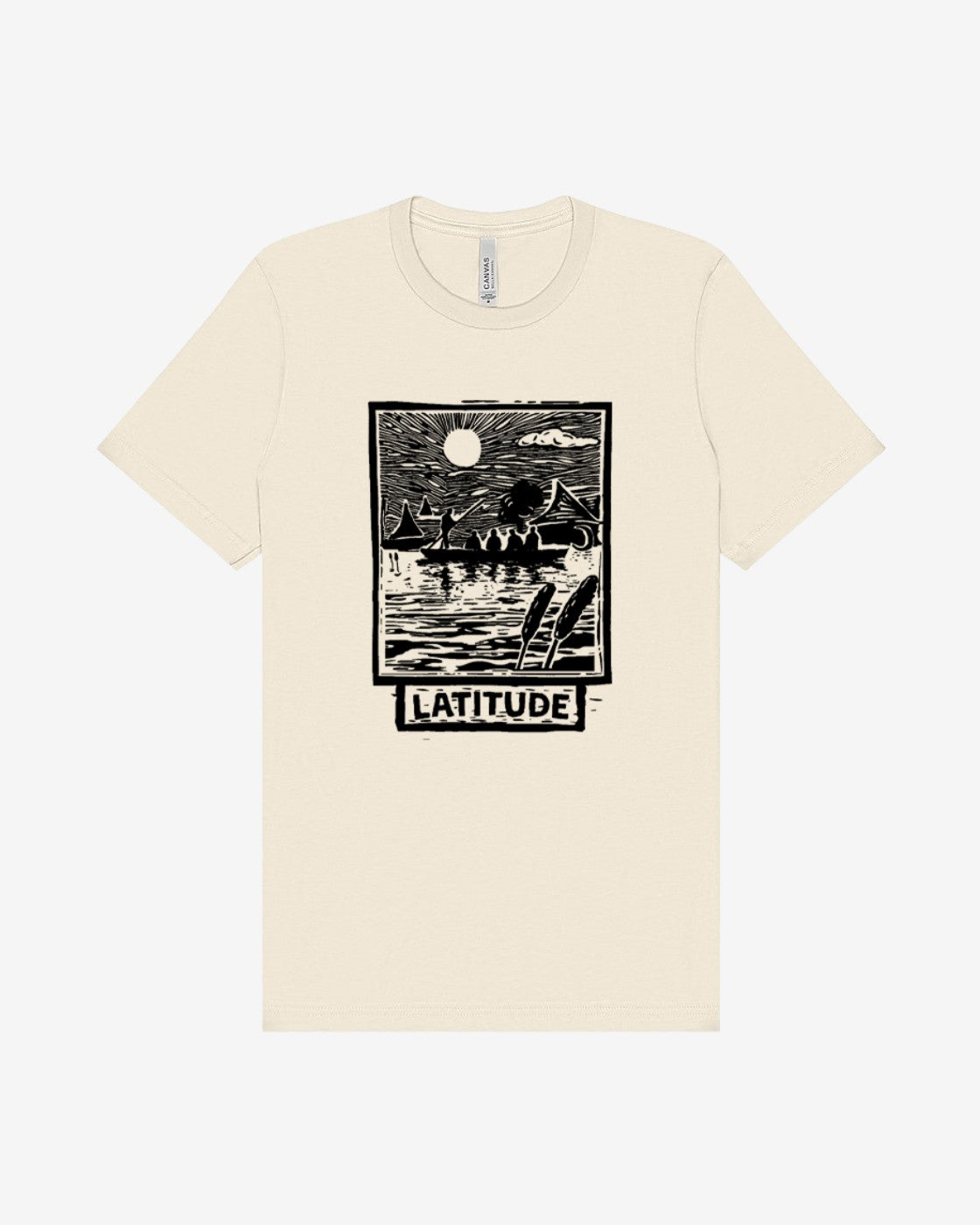 The Latitude Festival Stores Latitude Stencil Lake Natural T-Shirt is a beige unisex tee made from soft Airlume cotton, featuring a black and white lakeside scene and LATITUDE below the illustration.
