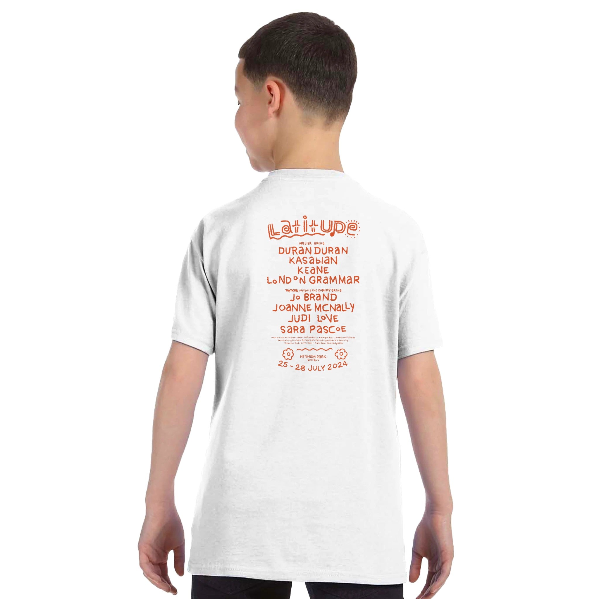 A boy wears the Latitude Kids 2024 Line Up White T-Shirt from the Latitude Festival Store, featuring Duran Duran and Kasabian on the back in orange text—perfect casual wear for kids. Event: 25–28 July 2024.