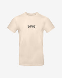 The 2025 Latitude Fashion T Shirt - Flowery Sheep is a light beige tee with LATITUDE and a small black graphic on the chest. It features a minimalistic design and a classic crew neckline.