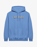 Introducing the Latitude 2026 Line-Up Blue Hoodie from the Latitude Festival Store—a light blue cotton-polyester blend featuring a convenient front pocket and "LATITUDE" boldly printed in white uppercase letters across the chest. This made-to-order hoodie delivers comfort and style, perfect for everyday wear.