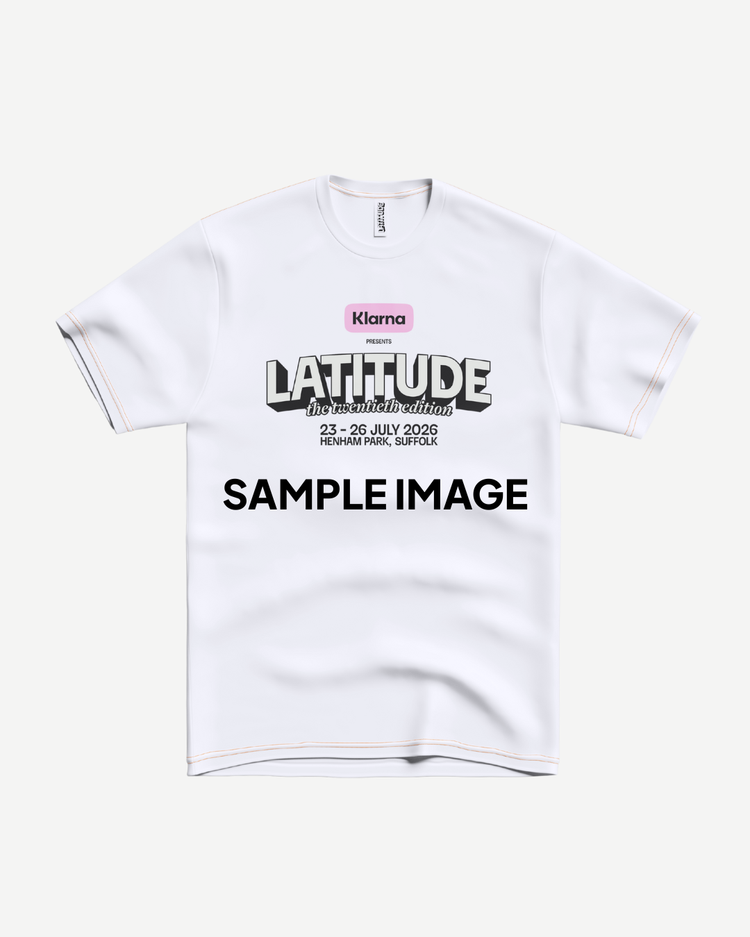 PRE-ORDER the 2026 Event T-Shirt from Latitude Festival Store—white with "Klarna presents LATITUDE the reconstruction 23-26 July 2026 Henham Park, Suffolk" and a SAMPLE IMAGE boldly printed—ideal festival merch.