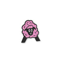 The Latitude Festival Store’s Latitude Pink Sheep Pin Badge features a cartoon sheep with a black face, black legs, and fluffy pink wool standing in an A shape on a plain white background.