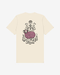The Latitude 2025 Pink Sheep Natural T-Shirt from Latitude Festival Store is a cream unisex tee with a pink sheep among plants, LATITUDE and 2025 beneath the graphic, made of soft Airlume cotton with vibrant DTG printing.