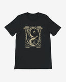 Black t-shirt with a gold graphic design on a white background
