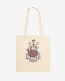 Beige tote bag with a printed design of a sheep and flowers on a white background
