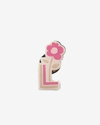 Letter 'L' with a pink flower on a white background