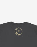 Black t-shirt with a gold circular design on the back against a white background