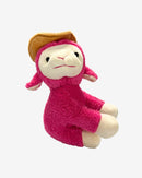 Plush toy with pink outfit and brown hat on a white background
