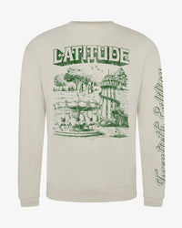 Light beige Latitude Merry Go Round Sweatshirt with a green illustration on the back featuring a carousel, a lighthouse, and the word LATITUDE in decorative lettering.