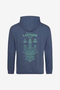The AWD Kids Classic 2023 Line Up Hoodie is a blue hoodie with a hood and long sleeves, showcasing the Latitude festival lineup in green text on the back with artists and event details for July 2023. Displayed against a plain white background.